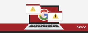 Image depicting a laptop with the Google logo in the center with pop up windows showing hazard symbols.